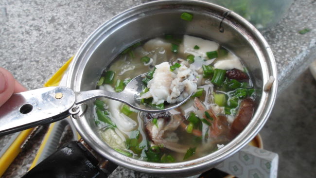 Fish soup with bean curd and vegetables